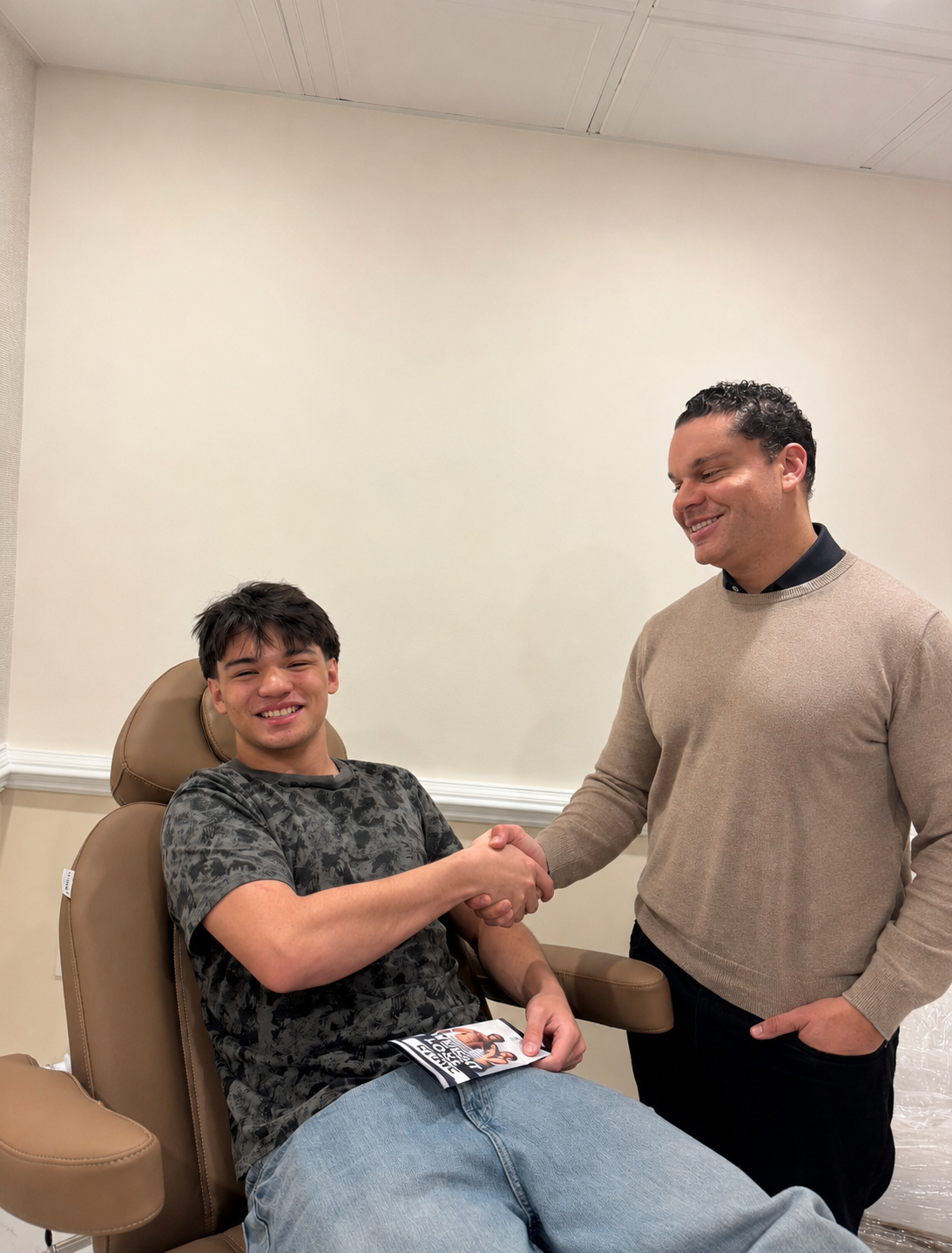 Dr. John Roxborough with a patient